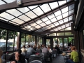 Retractable structure on restaurant patio