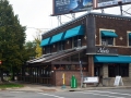 Retractable structure on restaurant patio