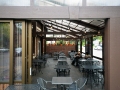 Opening restaurant patio structure