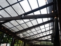 Translucent retractable roof on restaurant patio