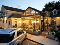 Retractable patio enclosure on restaurant