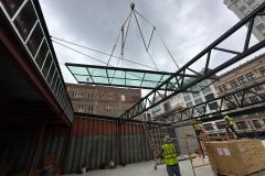 Installing glass roof on restaurant patio