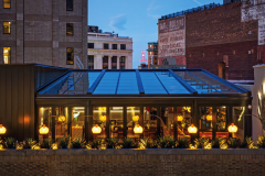 restaurant patio with glass roof and opening walls