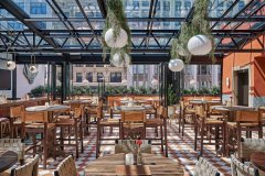 restaurant patio with glass roof and opening walls