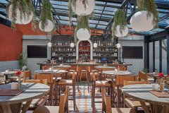 restaurant patio with glass roof and opening walls