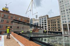 Installing glass roof on restaurant patio