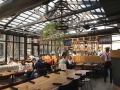 Restaurant patio with retractable structure