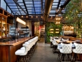 Upscale restaurant patio structure with retractable roof